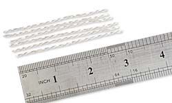 Several lengths of chain next to a ruler
